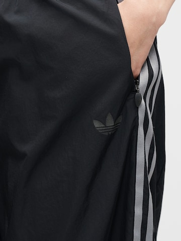 ADIDAS ORIGINALS - Perna larga Calças 'Teamgeist' em preto