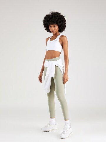 UNDER ARMOUR Skinny Workout Pants 'Motion' in Green