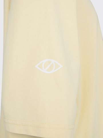 UNFOLLOWED x ABOUT YOU - Camiseta 'RARE' en amarillo