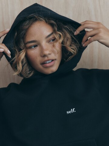 Sweat-shirt self. en noir