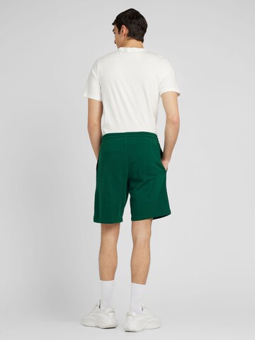 Reebok Regular Trousers in Green
