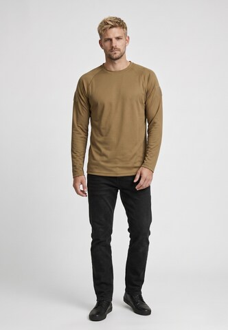 Maglietta di Brandit in beige