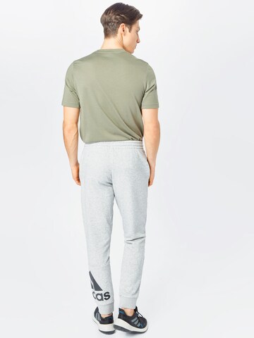 ADIDAS SPORTSWEAR Tapered Sporthose 'Essentials French Terry Tapered Cuff Logo' in Grau