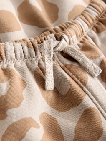 Next Облекло за бягане в бежово