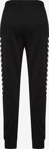 Effilé Pantalon de sport 'Staltic' Hummel en noir