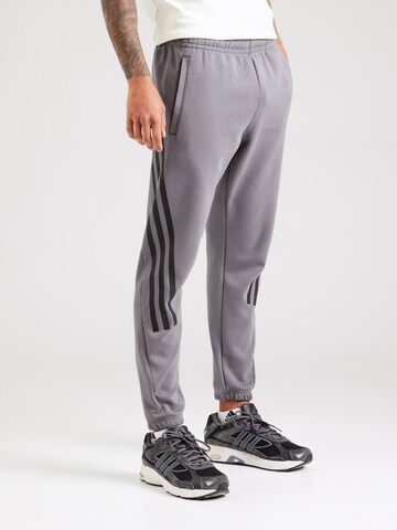 ADIDAS SPORTSWEAR Tapered Sports trousers 'Future Icons' in Grey: front