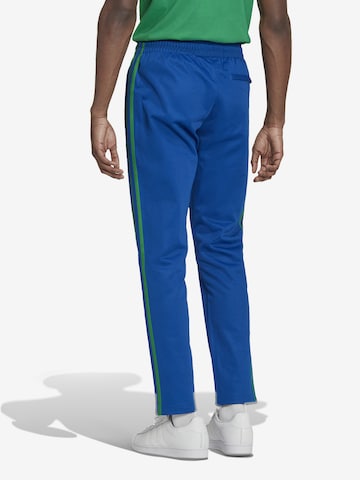 ADIDAS ORIGINALS Regular Trousers 'Adicolor 70S Striped' in Blue