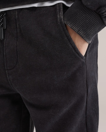 Effilé Pantalon WE Fashion en noir