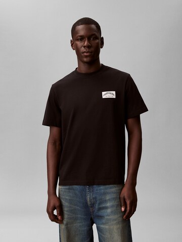 T-Shirt 'Varsity Badge' Calvin Klein Jeans en noir : devant