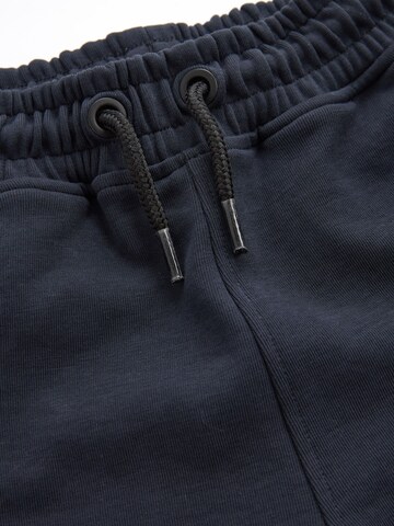Next - Tapered Pantalón en azul
