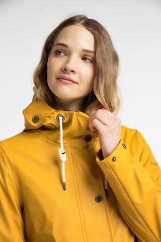 Manteau fonctionnel Schmuddelwedda en jaune