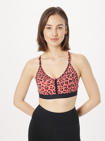 Bustier Soutien-gorge de sport 'INDY' NIKE en orange : devant