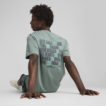 PUMA Shirt 'Road To Unity' in Groen: voorkant