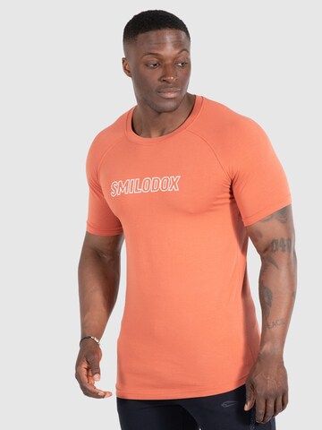 Smilodox Functioneel shirt 'Timmy' in Oranje