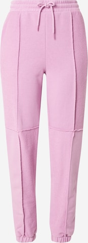 Monki Spodnie w kolorze różowy: przód
