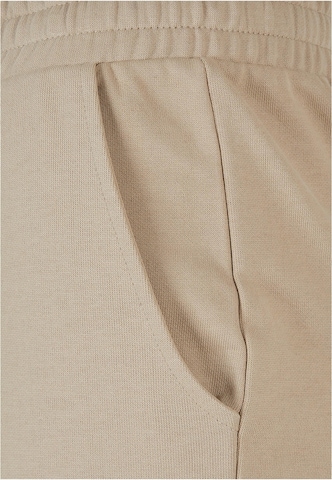Wide leg Pantaloni di Urban Classics in beige