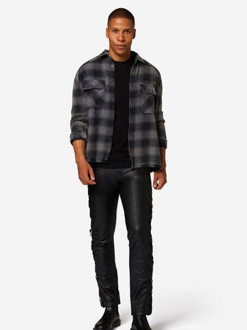 Skinny Pantaloni 'Cow Waxy' di RICANO in nero