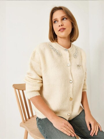 Cardigan Bianco Lucci en beige