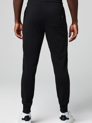 Fabletics Tapered Hose in Schwarz