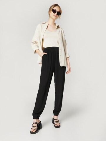 Guido Maria Kretschmer Women Tapered Trousers 'Lola' in Black