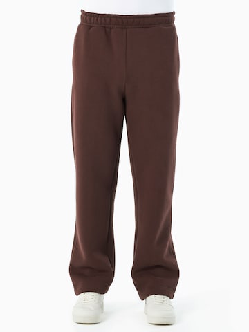 Organication Loose fit Pants in Brown: front