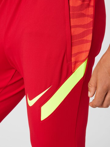 NIKE Slimfit Παντελόνι φόρμας 'Strike' σε κόκκινο