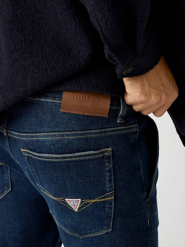 GUESS Skinny Jeans 'Adam' in Blau