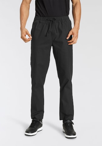 Champion Authentic Athletic Apparel Regular Workout Pants in Black: front