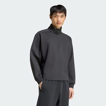 ADIDAS SPORTSWEAR - Camiseta deportiva en negro: frente