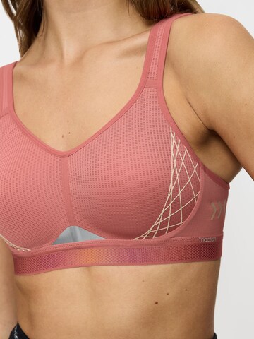 TRIUMPH Bustier Sport bh ' Triaction Cardio Flow ' in Roze