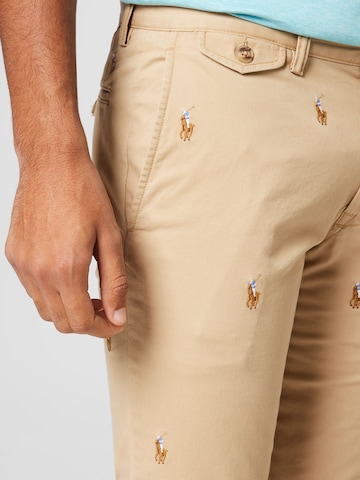 Polo Ralph LaurenSlimfit Chino hlače 'BEDFORD' - smeđa boja