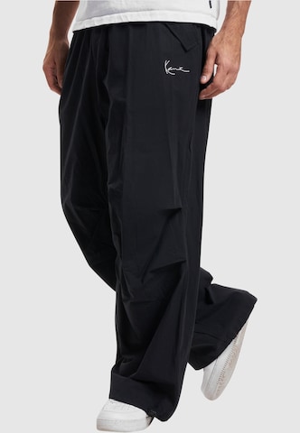 Loosefit Pantalon Karl Kani en noir : devant