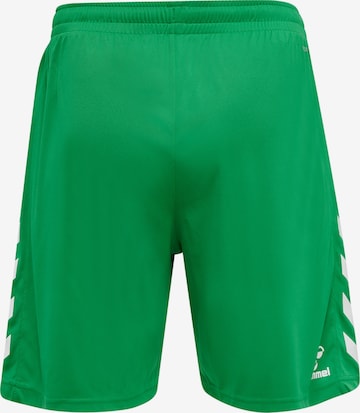 Hummel Regular Sports trousers in Green