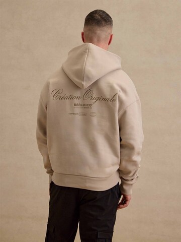 DAN FOX APPAREL Sweatshirt 'Malte' i beige: framsida