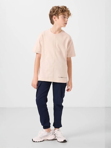 Pantalon 'TOMMY Kinder Cargo-Joggerhose' Tommy Life en bleu
