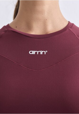 Maglia funzionale di Aim'n in rosso