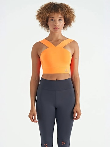Haut de sport Tommy Life en orange : devant