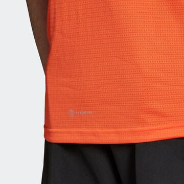 Maglia funzionale 'Own the Run' di ADIDAS SPORTSWEAR in arancione