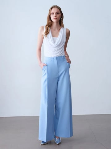 Top di Dilvin in bianco
