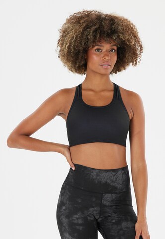 Athlecia Bustier Sportmelltartók 'Myolie' - fekete: elől