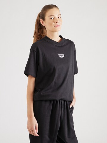 Tricou de la Reebok pe negru: față