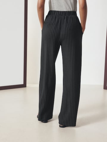 Wide leg Pantaloni di Next in nero