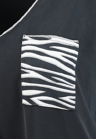 Key Largo Tričko 'Zebra' – černá