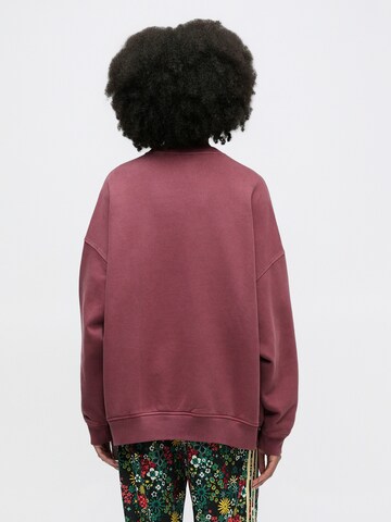 Felpa 'ESS' di ADIDAS ORIGINALS in marrone: dietro