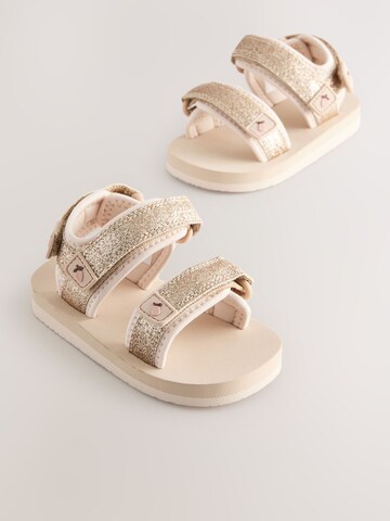 Next - Sandalias en oro