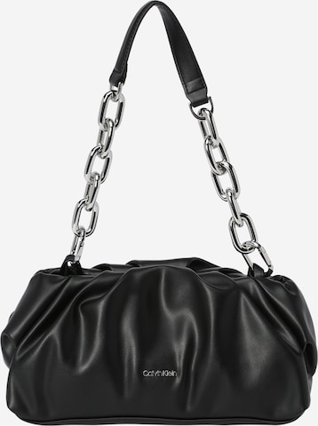 Calvin Klein - Clutches em preto: frente