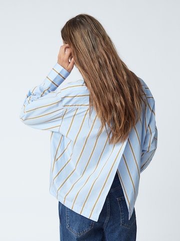 Chemisier 'Amora' co'couture en bleu