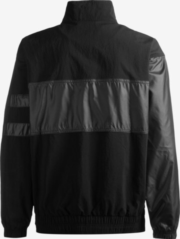 Veste de sport NIKE en noir