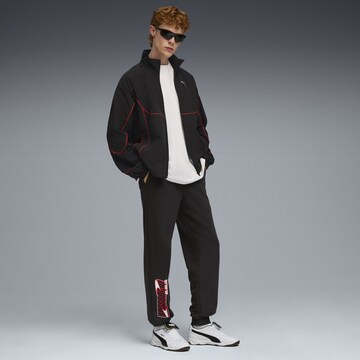 Effilé Pantalon de sport PUMA en noir