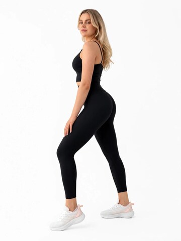 2SKIN - Slimfit Pantalón deportivo en negro